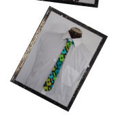 This is what you need for that sad brown suit you plan on wearing for that meeting with your parole officer. Available in our shop.