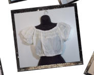 Based on a late 1940s design, this delightful cropped peasant top is trimmed with ribbon on the front, back and sleeves. Available in our store.